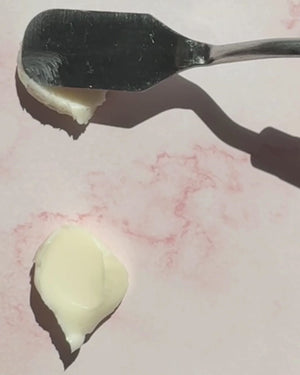 video comparing original calm cream texture with smoother texture of 2024 reformulation